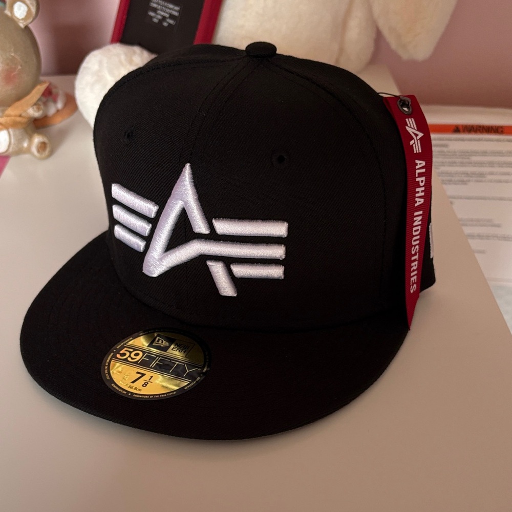 Alpha Industries Black Snapback with White Logo and Red Tag